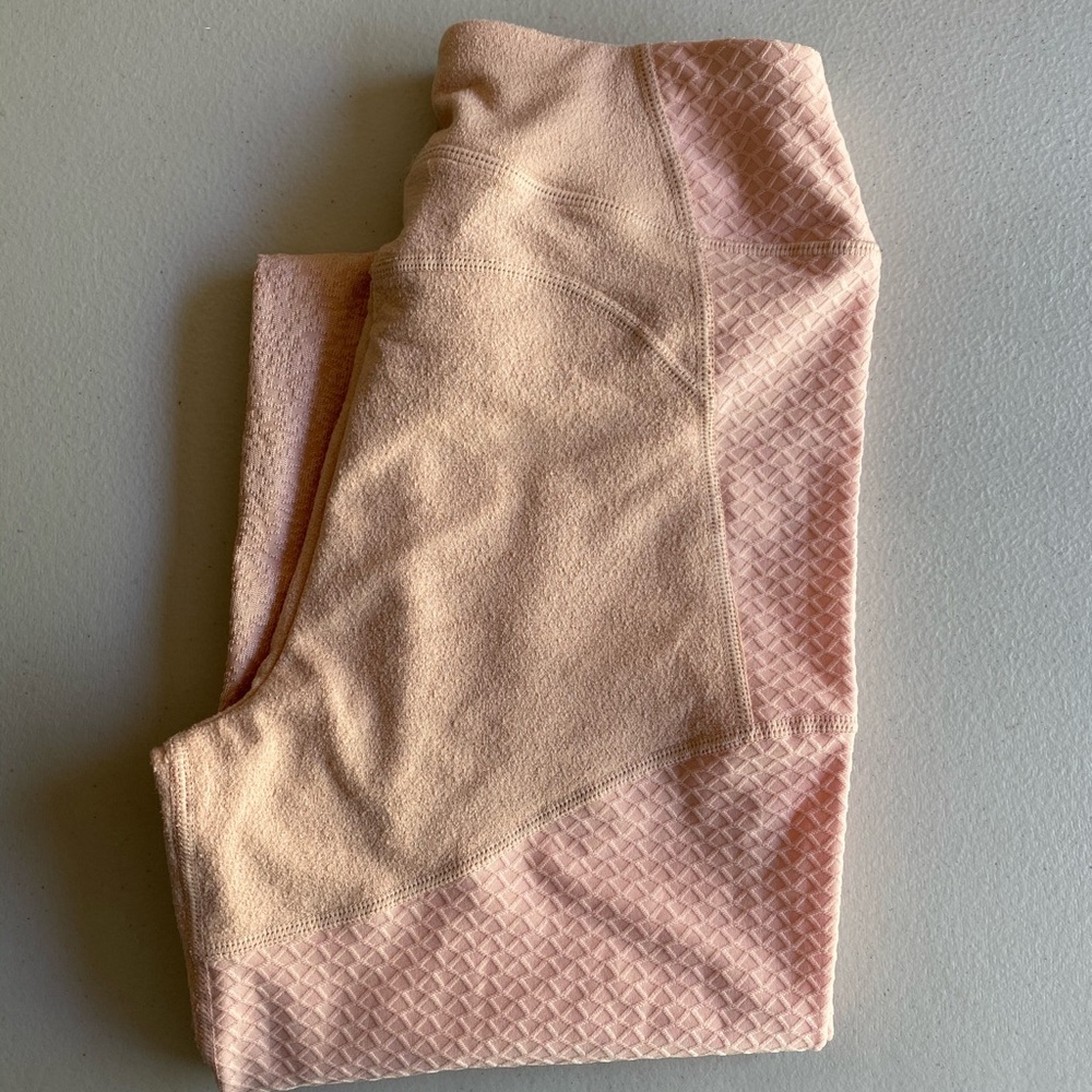 Peach colored GynShark leggings